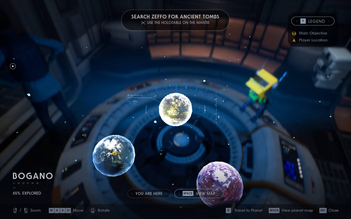 The planet travel map, with the mouse and key controls displayed under it.
