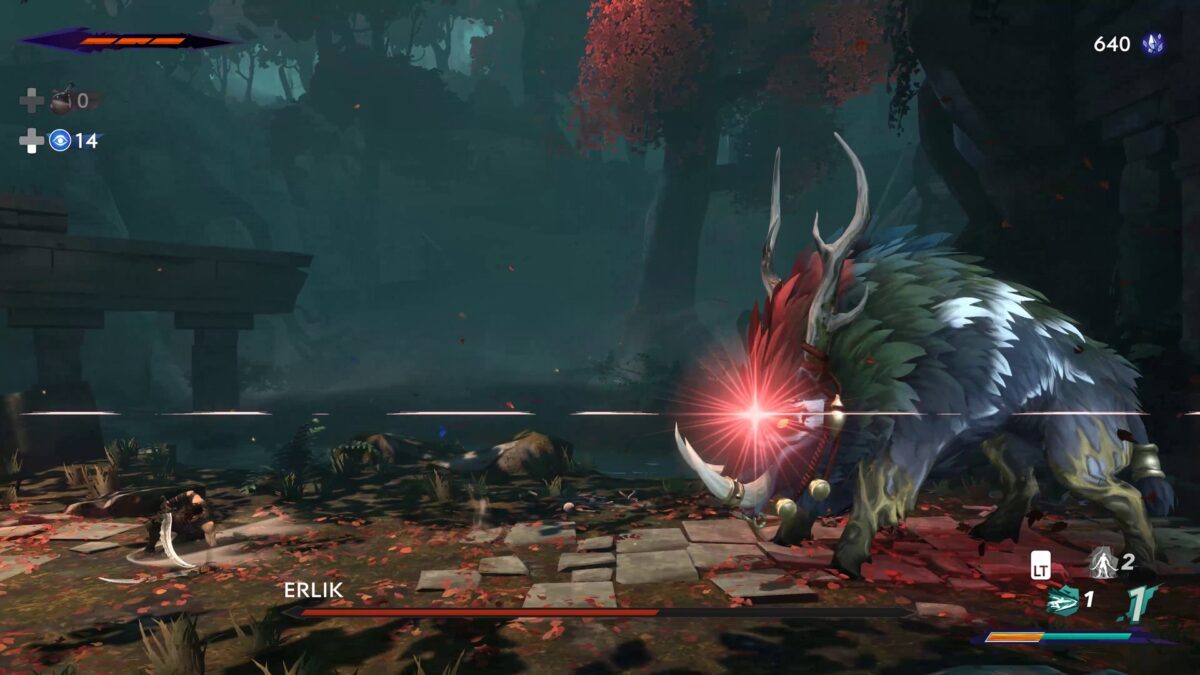 Screenshot of Sargon on the left, battling a boss with the shape of a giant boar with big horns. The enemy has a red glimmer indicating that the attack must be dodged.